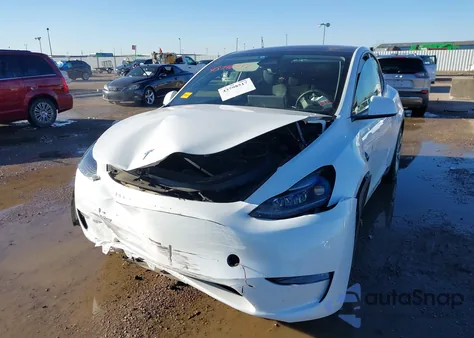 2023 Tesla Model Y Rwd from USA, damaged, VIN 7SAYGDED9PF942211